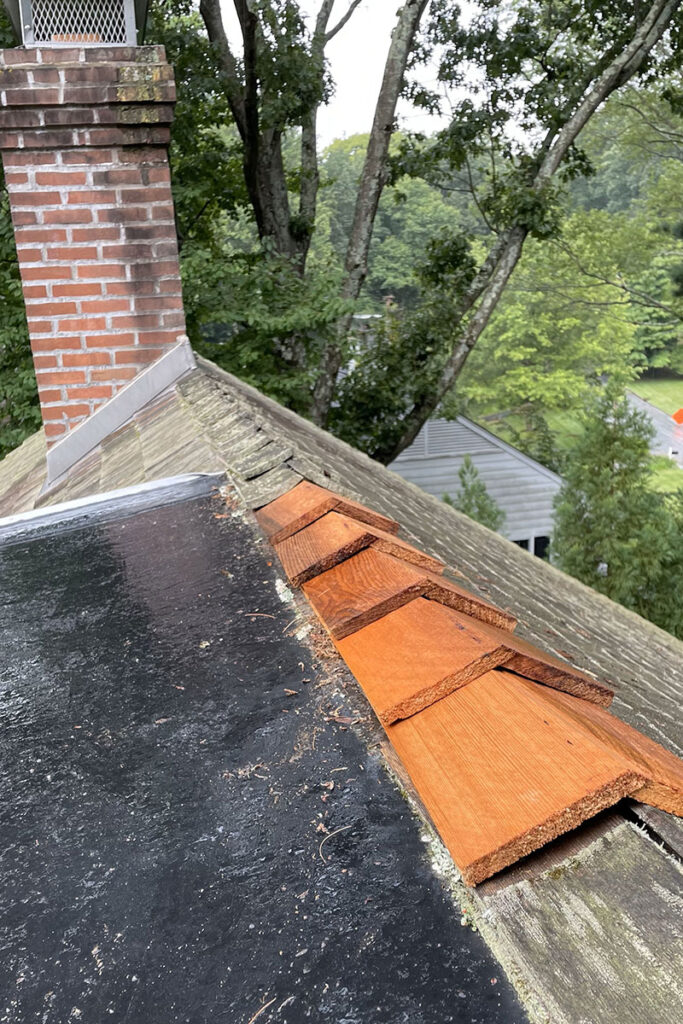 Roof being repaired by MR Roofing